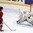 HELSINKI, FINLAND - JANUARY 3: Switzerland's Denis Malgin #13 stickhandles the puck in on Belarus' Vladislav Verbitski #25 during relegation round action at the 2016 IIHF World Junior Championship. (Photo by Andrea Cardin/HHOF-IIHF Images)

